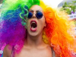 LGBTQ Ally yelling with colorful hair
