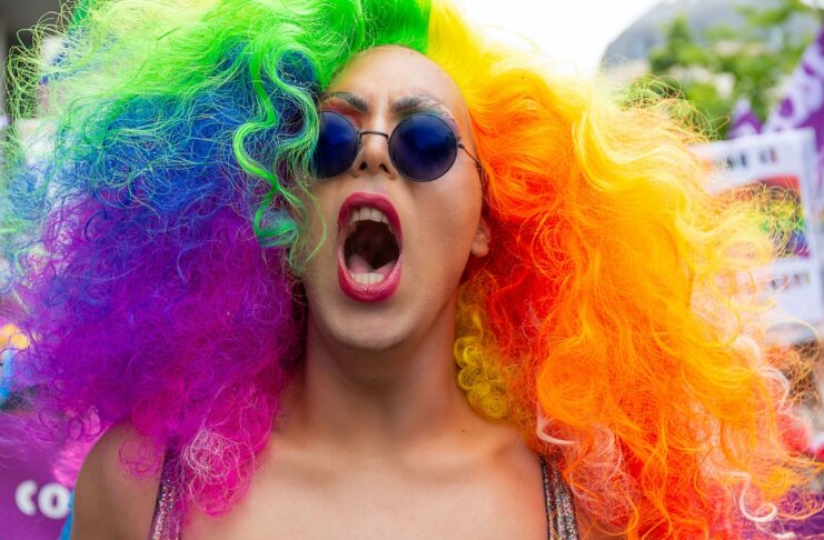 LGBTQ Ally yelling with colorful hair