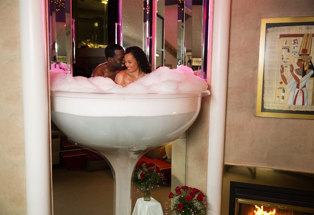Romantic valentine's day getaway two people in a champagne bath